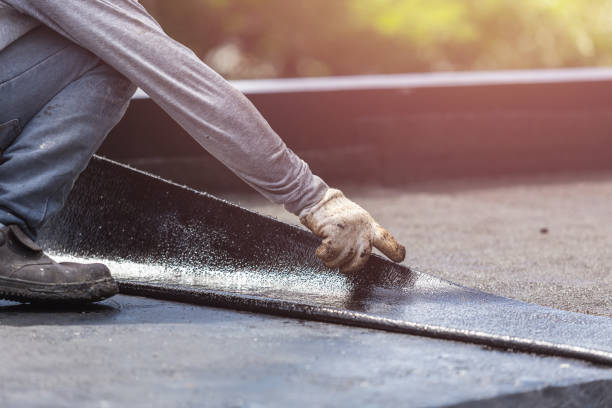 Professional Basement Waterproofing technician working in Madison Center, CT